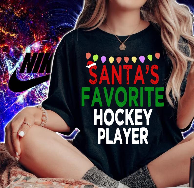 Santa's Favorite Hockey Player Christmas Xmas Lights Hat sweater t-shirt woman shirt